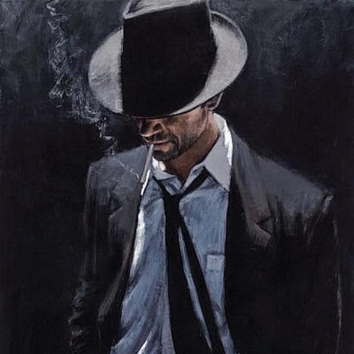 Мужчина в шляпе с сигарой