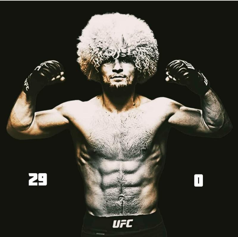 Хабиб Нурмагомедов в папахе с поясом и с орлом